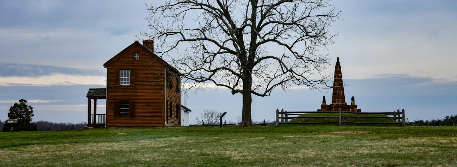 The Henry Hill house and monument at Manassas National Battlefield Park, Virginia, under an overcast winter sky