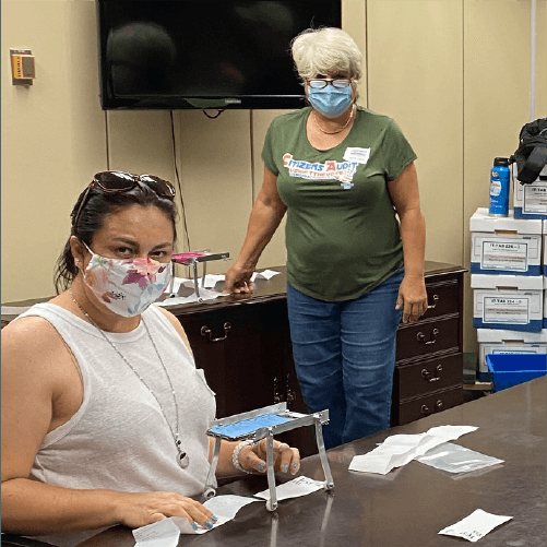 Actual Vote users video-recording poll tapes in the Broward County Board of Elections office in 2020