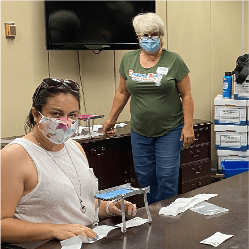 Actual Vote users video-recording poll tapes in the Broward County Board of Elections office in 2020